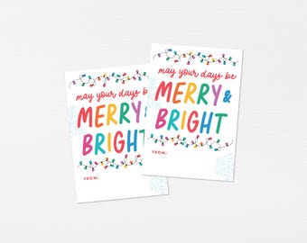 May include: Two printable gift tags with a festive holiday message. The tags feature a string of colorful lights and the text "may your days be merry & bright".