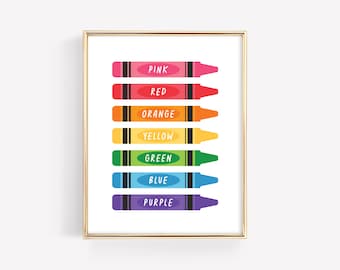May include: A printable wall art design featuring a rainbow of crayons with the color names written on each crayon. The colors are pink, red, orange, yellow, green, blue, and purple.
