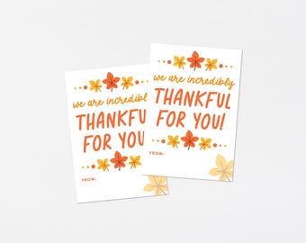 May include: Two printable gift tags with a fall theme. The tags feature orange and yellow leaves and the text "We are incredibly thankful for you!" with the words "From:" at the bottom of each tag.