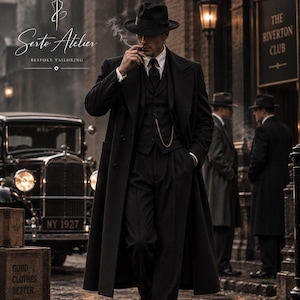 May include: A black three-piece suit consisting of a long overcoat, a waistcoat with a gold pocket watch chain, and trousers, worn with a white shirt, black tie, and a fedora hat. Text reads Serto Atelier Bespoke Tailoring and Good Clothes Better Men.