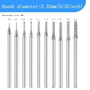 May include: A set of ten silver-colored metal rotary tool burr bits with a shank diameter of 2.35mm (3/32 inch). The bits are arranged in ascending order of tip size, labeled with measurements from 0.4mm to 2.6mm, displayed against a white background.