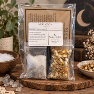 May include: A New Moon Ritual Kit in a clear plastic bag containing a black chime candle, a small bag of coarse salt and moonstone crystal chips, and a small bag of dried ritual herb blend. Includes an instruction card with printed text.