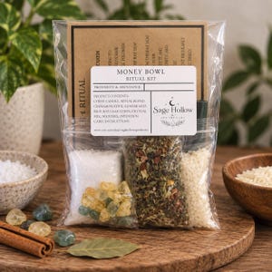 May include: A clear plastic bag containing a Money Bowl Ritual Kit by Sage Hollow Apothecary. The kit includes a chime candle, ritual herb blend, coarse salt, rice, bay leaf, coins, crystal mix, matches, and an instruction card with printed text.