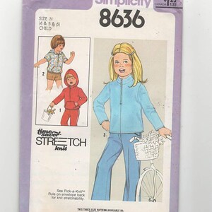 May include: Simplicity sewing pattern number 8636 for children's clothing. The pattern includes instructions for a blue jacket with a zip, red sweatshirt with a hood, and a pair of trousers. The pattern is for sizes 4, 5, and 6.
