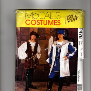 May include: A McCall's Costumes sewing pattern envelope, number P478, size Y (Sml-Med). The front features two individuals in historical-style outfits: one in a brown tunic with a hat, and one in a blue and white tunic with a blue cap. Text includes McCall's Costumes.