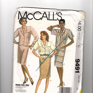 May include: A vintage McCall's sewing pattern envelope featuring illustrations of women's skirt suits and a striped shirt and skirt set. The envelope is white with the text "McCall's" in large black letters. The price is $4.00.