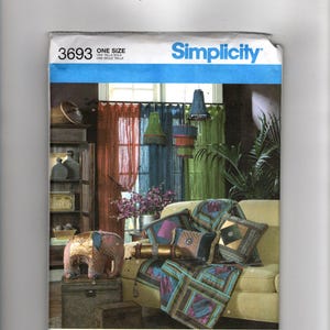 May include: Simplicity sewing pattern featuring a living room scene with curtains, pillows, and a blanket. The pattern number is 3693, and it is one size. The image includes the text "Sign-up for our free newsletter today at simplicity.com."