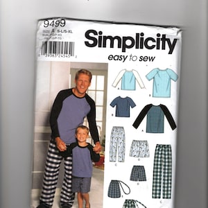 May include: Simplicity sewing pattern 9499. The pattern features a man and a child wearing matching raglan sleeve shirts and pajama pants. The pattern includes various pajama styles, including shorts and pants, with different prints.