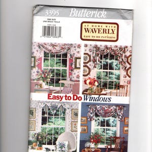 May include: A Butterick sewing pattern for window treatments, showing four window scenes with floral curtains and valances. The cover includes the text "Easy to Do Windows" and "At Home with Waverly".