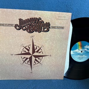 Vintage, Jimmy Buffett - &quot;Cambios de latitudes, cambios de actitud&quot;, vinilo, álbum de discos, Margaritaville, Banana Republics