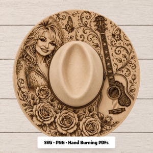 May include: A tan fedora hat featuring a detailed laser-engraved design on the brim. The artwork includes a portrait of a woman with voluminous hair, an acoustic guitar, blooming roses, butterflies, and swirling vines. Text reads: SVG • PNG • Hand Burning PDFs.
