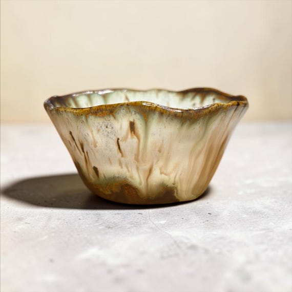 Tactile fluted-rim stoneware prep bowl that looks straight out of a ceramics studio — the kind of artisan kitchen piece that makes cooking feel elevated.