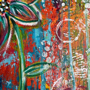May include: An abstract acrylic painting featuring a large, stylized flower with teal and dark green petals. The background is a vibrant, textured mix of orange, red, and blue paint with white circular stamps and vertical drips of paint.