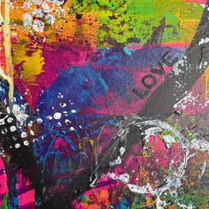 May include: An abstract painting on canvas featuring vibrant layers of neon pink, electric blue, bright orange, and lime green paint. The composition includes splatters of white and black, textured brushstrokes, and the word LOVE in black.