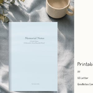 May include: A light blue notebook with the text Memorial Notes, A Gentle Space To Remember Every Beautiful Detail, and Tiny Canvas Atelier printed on the cover. The notebook is a printable PDF available in A4 and US Letter sizes, and is GoodNotes compatible.