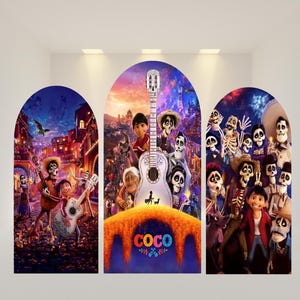 May include: Three arched backdrop panels featuring colorful scenes from the movie Coco. The panels display characters, a white guitar, and the word Coco in blue and orange letters against a vibrant background of marigold flowers and night skies.