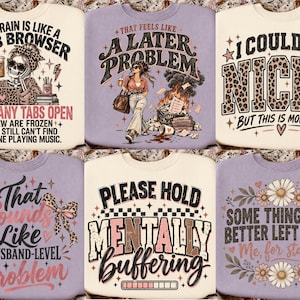 Può includere: Una collezione di sei felpe girocollo color crema e lavanda, ognuna caratterizzata da stampe grafiche uniche con testo che include 'My brain is like a web browser', 'That feels like a later problem', 'I could be nicer' e 'Mentally buffering'.