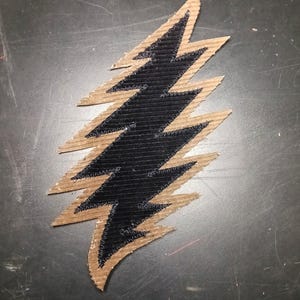 black and gold corduroy lightening bolt