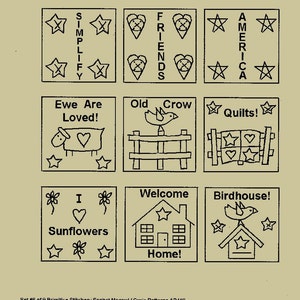 May include: A set of nine primitive stitchery patterns, each in a square frame. The designs include text like "Simplify," "Friends," and "America," along with images of a sheep, bird, and house. Stars and hearts are also featured.