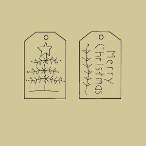 May include: Two black and white printable gift tags. One tag features a simple Christmas tree with a star on top. The other tag says "Merry Christmas".