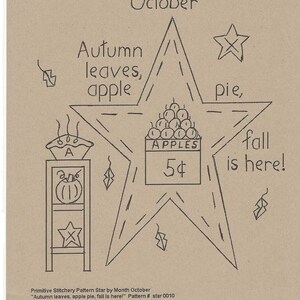 May include: A hand-drawn star-shaped design with the word "October" at the top. The star contains the phrases "Autumn leaves, apple pie, fall is here!" and a depiction of apples for sale. A pumpkin and star are also drawn.