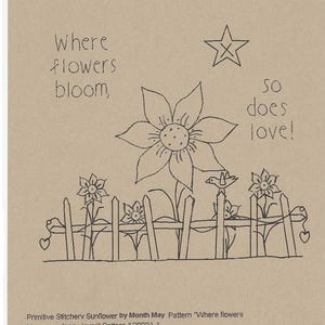 May include: A black and white line drawing of a sunflower with the text "Where flowers bloom, so does love!"  The sunflower is in a garden with a picket fence and a bird on top of the fence.
