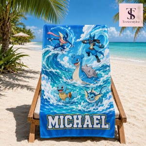 May include: A rectangular beach towel featuring a vibrant blue ocean wave design with five cartoon characters: Greninja, Lucario, Lapras, Squirtle, and Vaporeon. The name MICHAEL is printed in large, bold white letters with a dark blue outline at the bottom.
