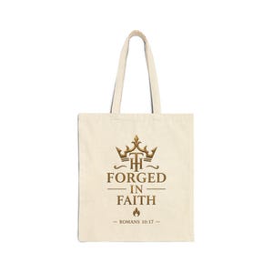 May include: A natural-colored canvas tote bag featuring a brown graphic print. The design includes a crown icon above the letters TH, the text FORGED IN FAITH, a small flame symbol, and the citation ROMANS 10:17 centered on the front surface.