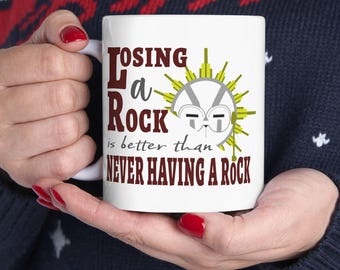 Esquie Losing a Rock Mug | Funny Expedition 33 Ceramic Cup