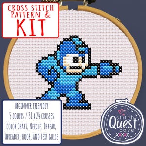 May include: Cross-stitch kit featuring a pixelated blue character in a wooden hoop. The kit includes a color chart, needle, thread, threader, hoop, and text guide. The text on the image says "Cross Stitch Pattern & Kit" and "Beginner Friendly".