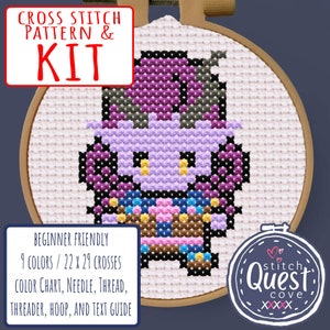 May include: Cross stitch kit featuring a purple and pink cartoon character with a yellow face. The kit includes a color chart, needle, thread, threader, hoop, and text guide. The kit is beginner friendly and uses 9 colors. The finished project is 22 x 29 crosses.
