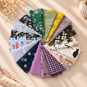 May include: A collection of fabric swatches arranged in a circular fan pattern. The pieces feature various prints including floral, checkered, gingham, houndstooth, and animal motifs in colors like green, yellow, purple, black, white, and light blue.