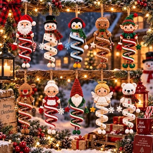 May include: Ten crocheted Christmas ornaments featuring characters including Santa, a snowman, a penguin, a gingerbread person, an elf, a reindeer, Mrs. Claus, a gnome, an angel, and a polar bear, each with a spiraling base and hanging loop.