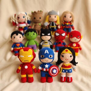 May include: A collection of eleven crocheted dolls representing various comic book characters, including Iron Man, Captain America, Wonder Woman, Superman, Hulk, Batman, Spider-Man, The Flash, Harley Quinn, Groot, and Thor, arranged in three rows.