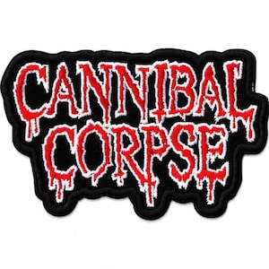 May include: An embroidered patch featuring the text CANNIBAL CORPSE in a stylized, dripping red font with a white outline. The lettering is set against a solid black background, and the entire patch has a thick, black stitched border.