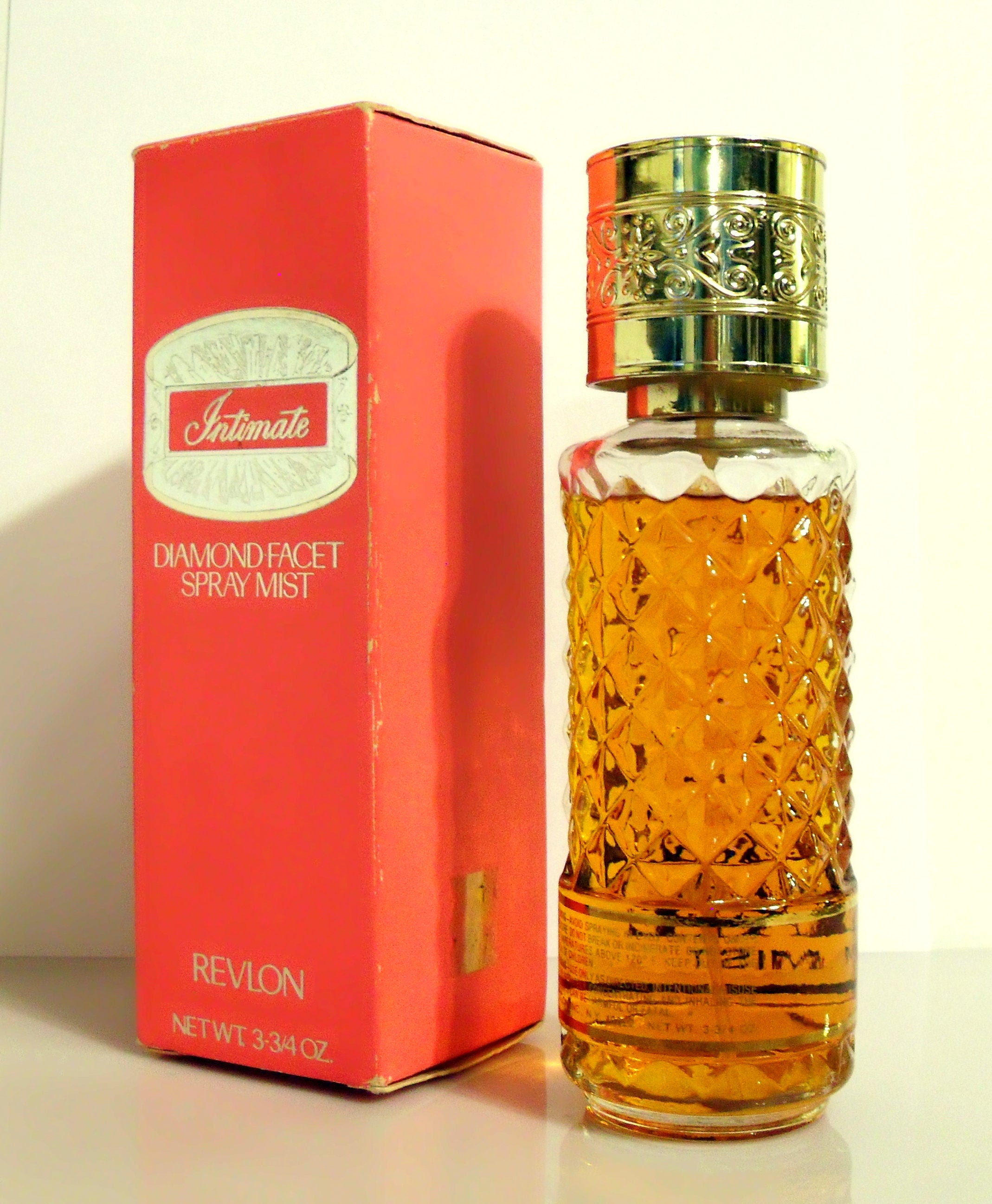 Vintage 1970s Intimate by Revlon 3.34 Oz Diamond Facet Spray Mist
