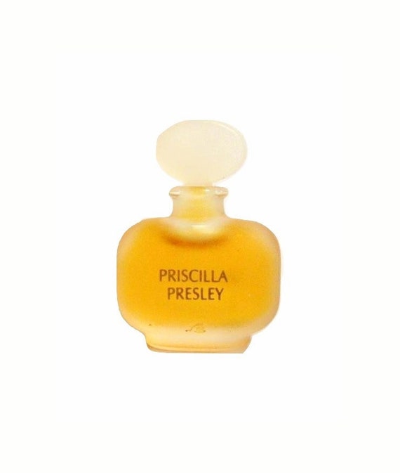 Priscilla Presley 0.08 oz Parfum Heart in apple perfume bottle, 1990