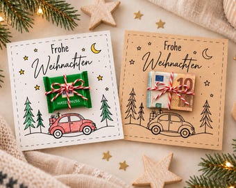 May include: Two square greeting cards with the text Frohe Weihnachten, featuring illustrations of a car with gifts, stars, and trees. One card holds a green chocolate bar, the other a ten euro banknote, both tied with red and white twine.