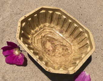 Large Antique Stained and Crazed Yellow Ware Mold; Grape Pattern