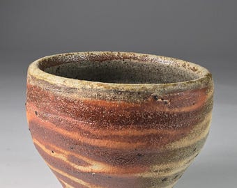 Tazón de té con rayas rojas