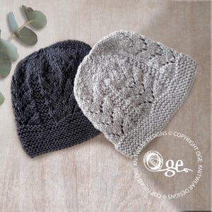 May include: Two knitted hats, one in dark charcoal gray and one in light heather gray, both featuring a textured leaf-like cable knit pattern and a garter stitch brim. A circular watermark with the text Oge Knitwear Designs is visible.