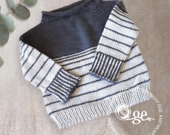 May include: A grey and white striped knitted jumper with a crew neck. The jumper has a solid grey section at the top and stripes on the sleeves and body.