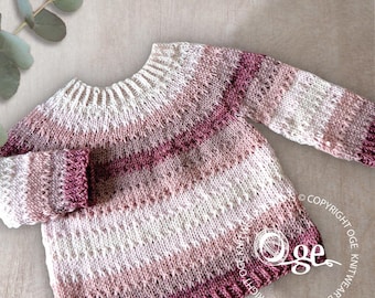 May include: A hand-knitted jumper in white, pink, and burgundy hues. The jumper has a round neckline and long sleeves. The design incorporates textured stitch patterns and colour gradients. The copyright text "COPYRIGHT OGE KNITWEAR DESIGNS" is visible.