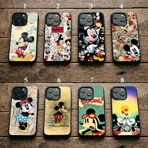 May include: Eight smartphone cases featuring various Mickey Mouse and Minnie Mouse illustrations. Designs include vintage stamps, collage patterns, comic book style art with the word BOOM, and a sunset scene with two characters kissing.