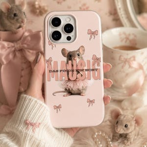 May include: A light pink smartphone case featuring a central graphic of a mouse wearing a pink tutu. The text "MAUSIG" is printed in large letters with "DAS FINDE ICH ECHT" underneath. The design includes small pink bow illustrations scattered across the case.
