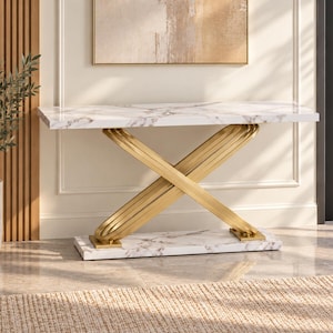 May include: A console table featuring a rectangular white faux marble top and base with grey veining. The support structure consists of two intersecting gold-toned metal legs formed by multiple parallel curved bars in an X-shape design.
