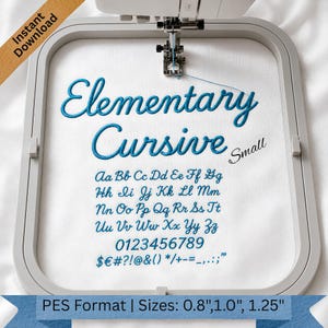 May include: An embroidery hoop containing white fabric with blue stitched text reading Elementary Cursive Small, followed by the alphabet in uppercase and lowercase, numbers 0-9, and various symbols. The hoop is attached to a sewing machine.