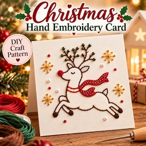 May include: A white square greeting card featuring a hand-embroidered reindeer with a red nose and scarf, brown antlers with green beads, and gold star accents. The card displays the text Christmas Hand Embroidery Card and DIY Craft Pattern.