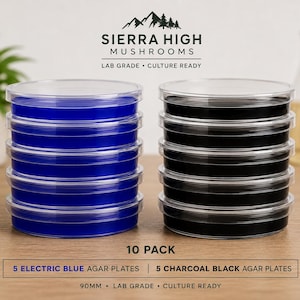 May include: A 10-pack of 90mm lab grade agar plates from Sierra High Mushrooms, featuring two stacks of five clear plastic petri dishes. One stack contains electric blue agar, and the other stack contains charcoal black agar, both culture ready.