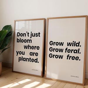 May include: Two framed art prints with inspirational quotes in black text on a cream background. One reads "Don't just bloom where you are planted." The other says "Grow wild. Grow feral. Grow free."